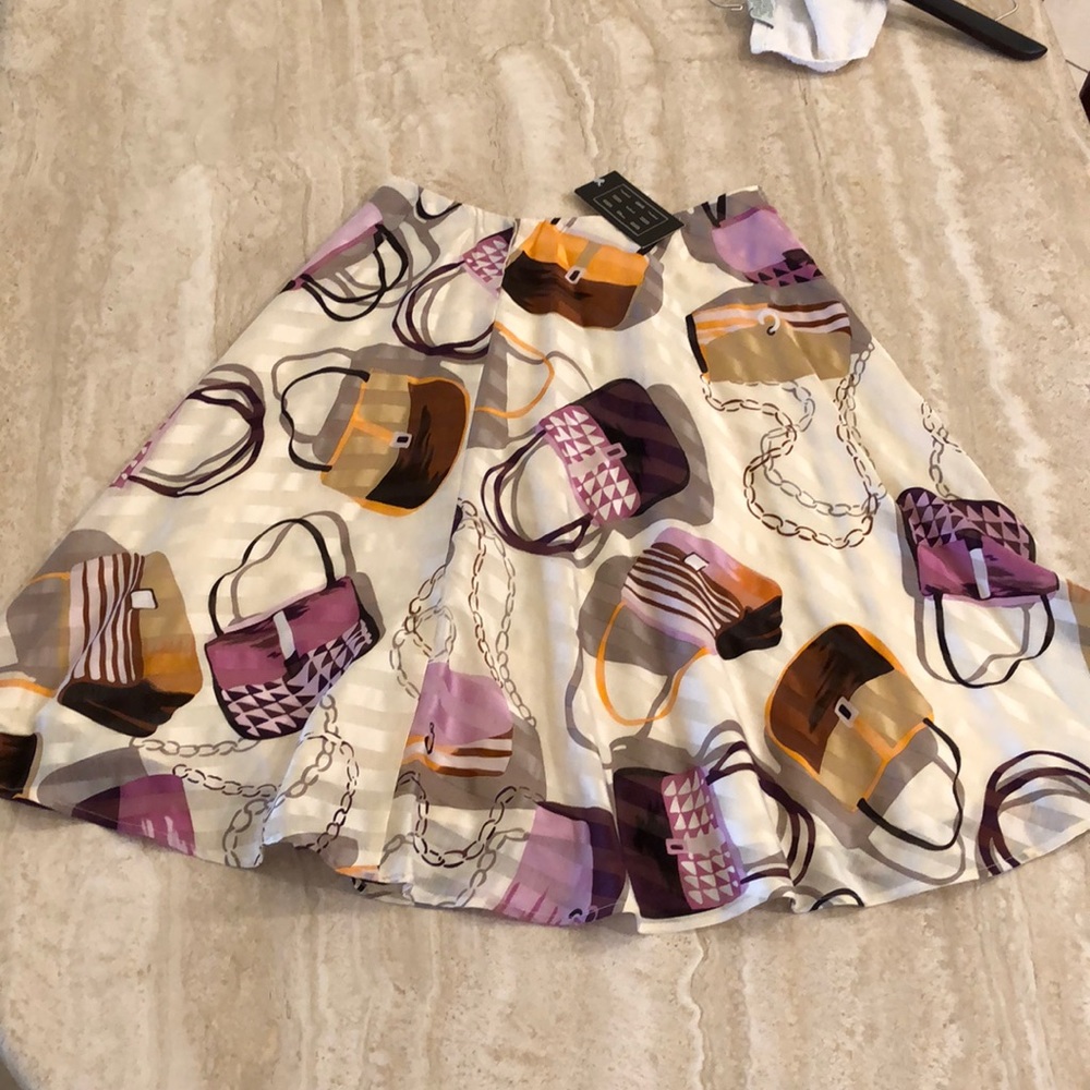 Size 2 Due’ Per Due’ skirt. Silk cotton blend.